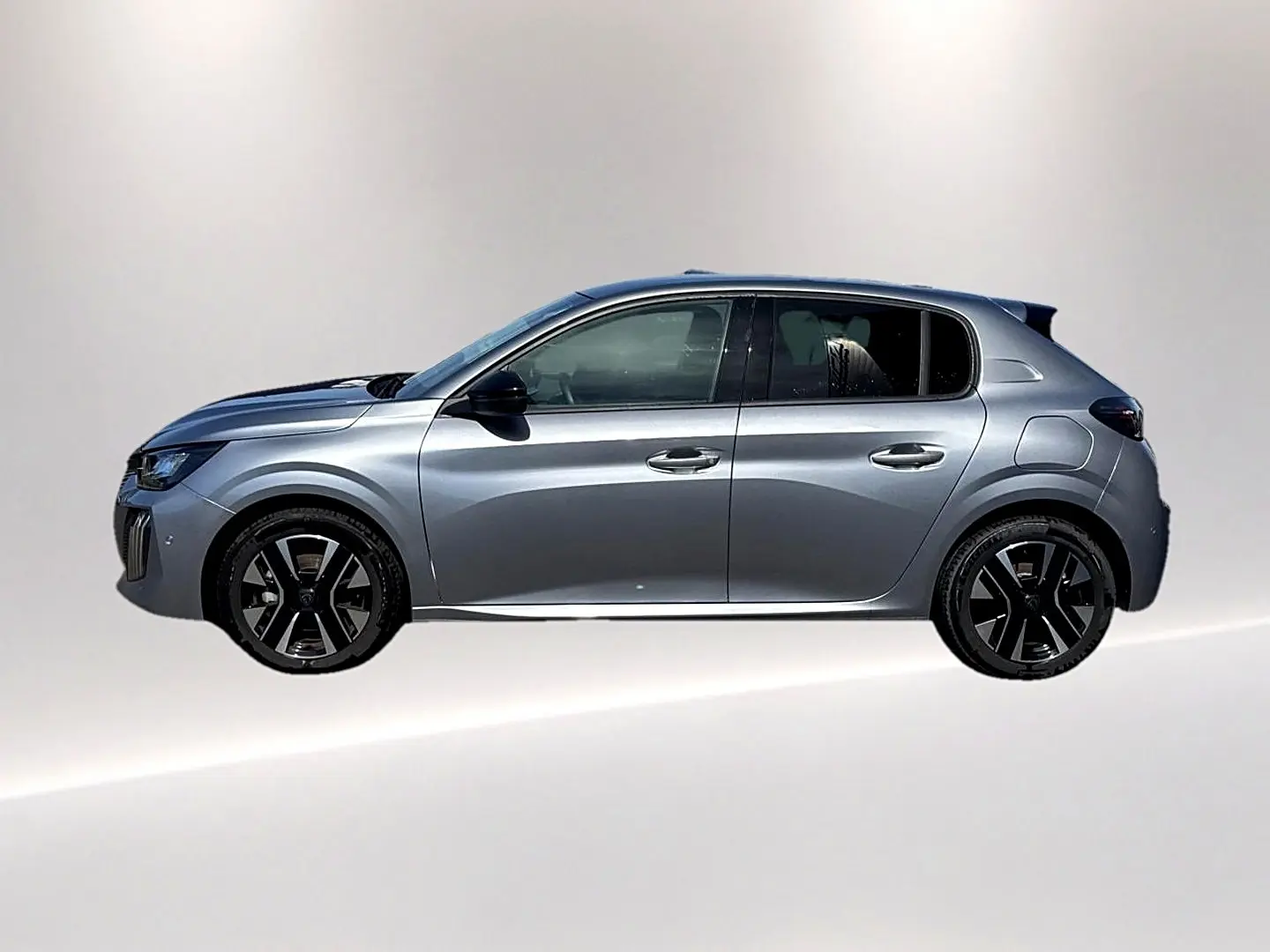 Profil droit de la Peugeot 208 1.2 100 Allure gris Artense avec jantes alliage noires et vitres teintées.
