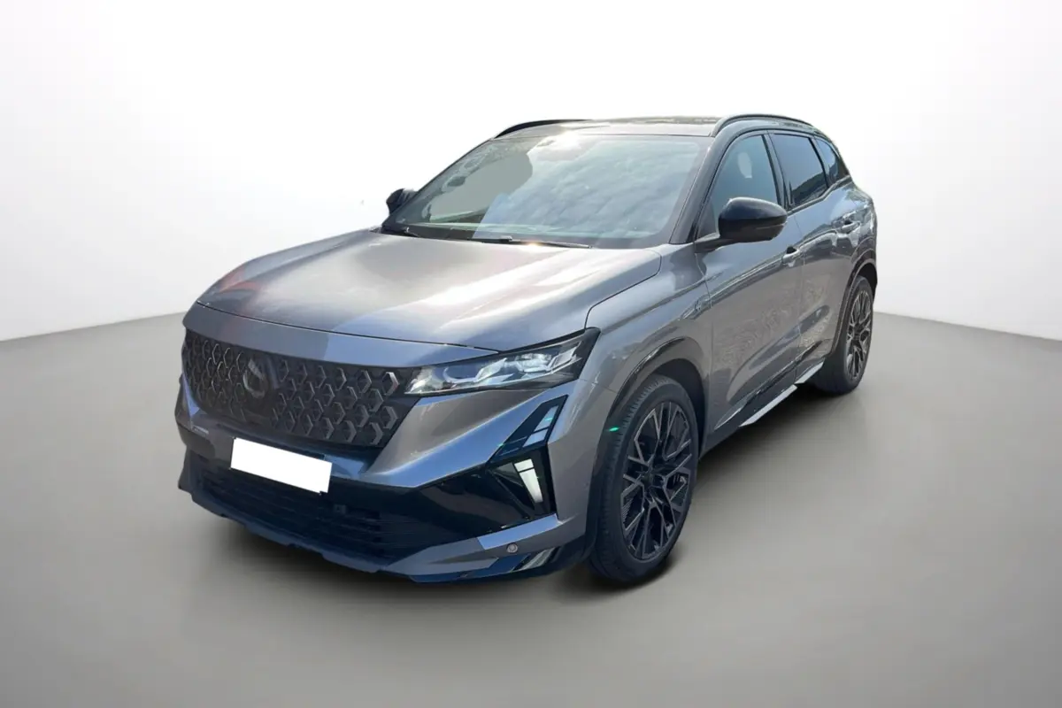 Renault Austral 200 Esprit Alpine gris schiste avec toit noir, vue 3/4 avant droit mettant en valeur les jantes alu 20 pouces.