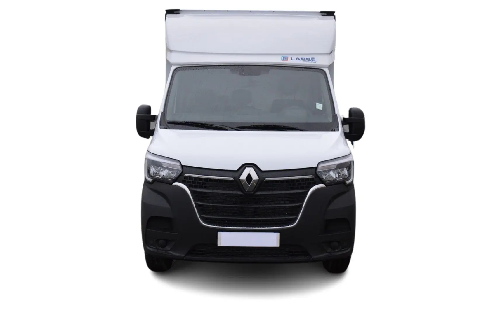 Vue avant frontale du Renault Master Plancher Cabine blanc avec calandre noire et logo Renault visible.