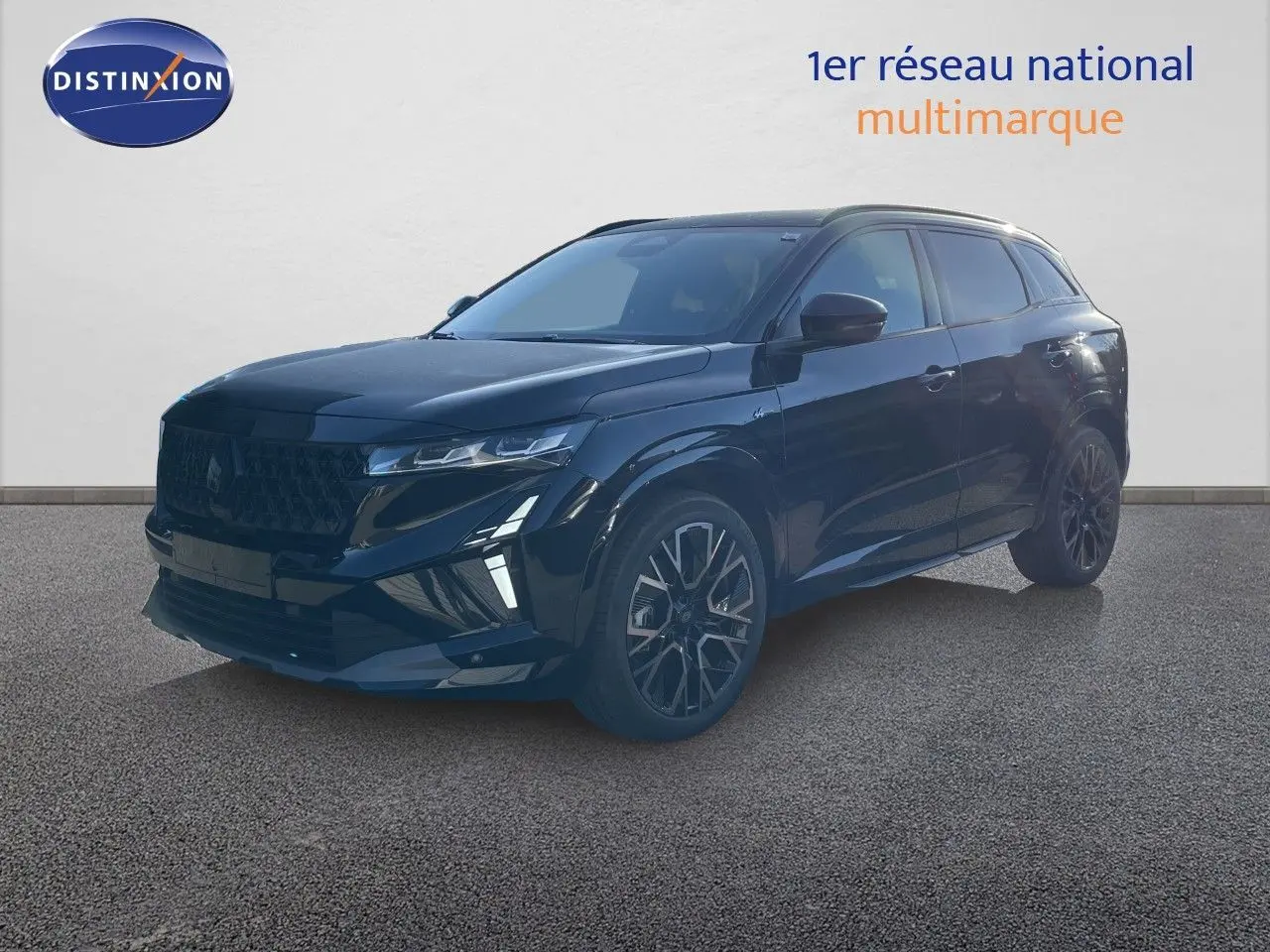 Renault Austral E-Tech hybride noir étoile métal en 3/4 avant droit avec jantes alliage et calandre noire distinctive.