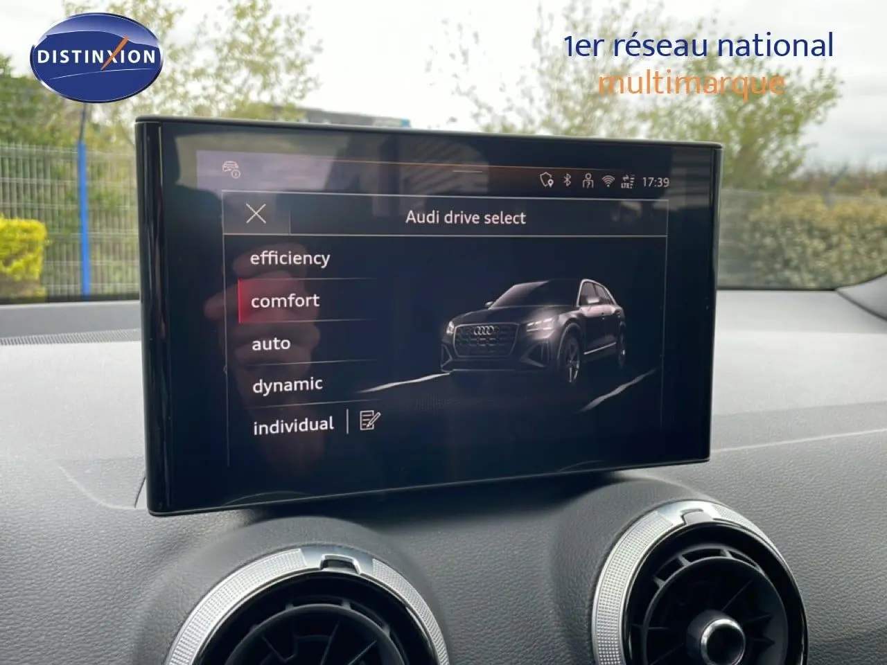 Écran central affichant les modes de conduite Audi Drive Select dans un Audi Q2 35 2.0 TDI S-Line 2025.
