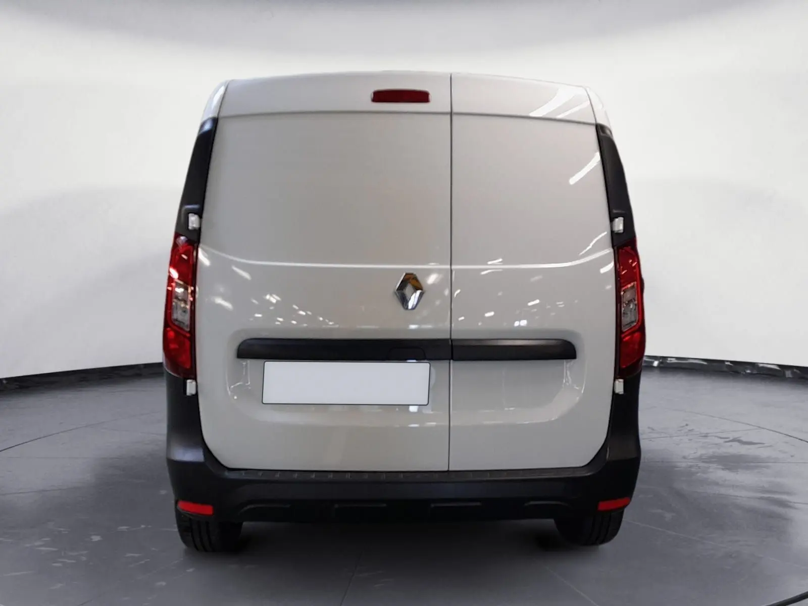 Vue arrière du Renault Express Van blanc 2023 avec portes battantes et feux rouges verticaux.