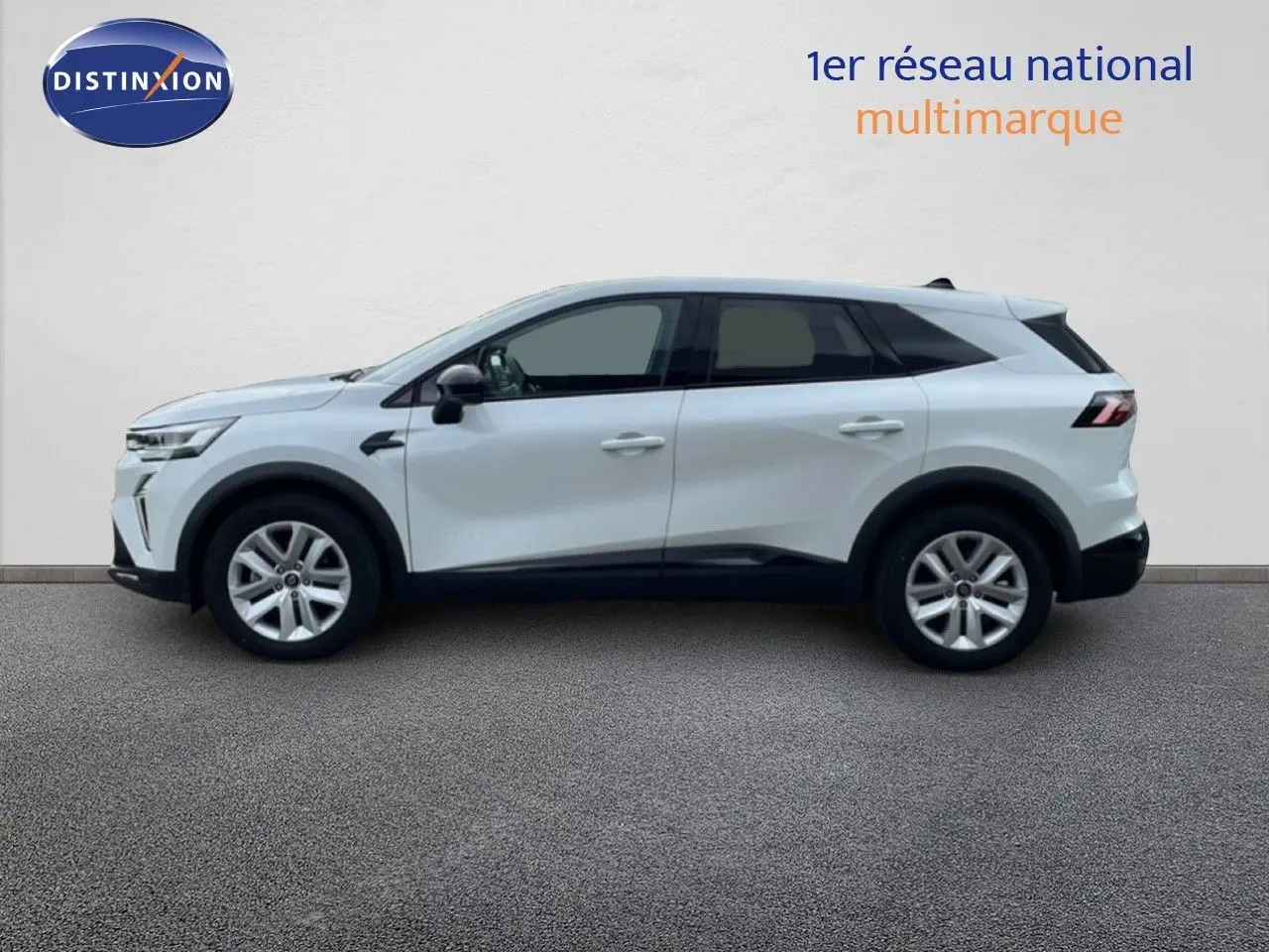 Renault Symbioz gris rafale métal en profil droit, SUV hybride avec lignes modernes et jantes argentées.