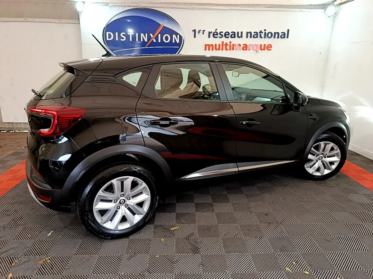 Renault Captur Business TCe 90 2021 noir, vue profil côté gauche, jantes alliage et feux arrière LED visibles.