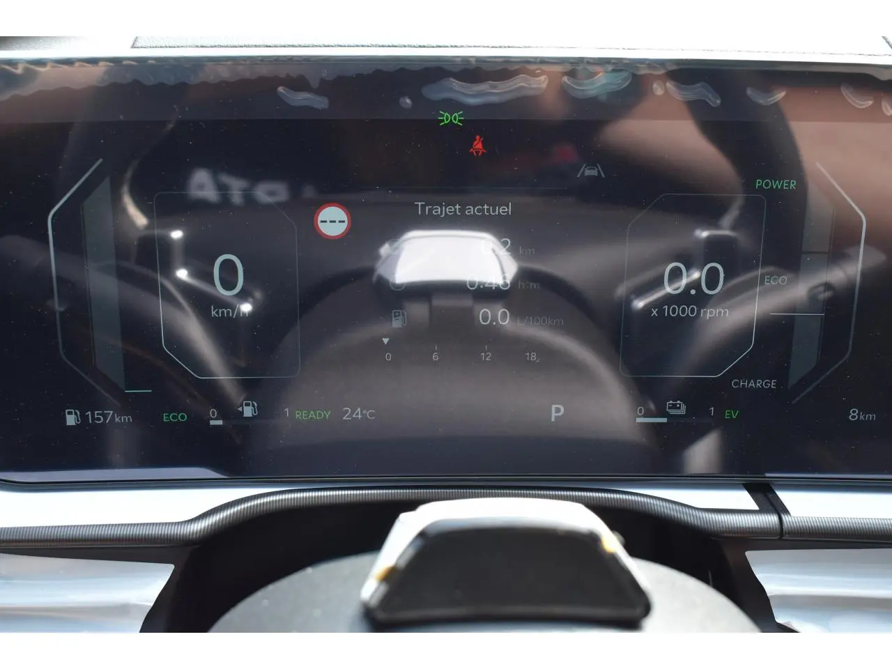 Tableau de bord digital 12,3'' du Kia Sportage hybride 2026, affichant les données de conduite en mode éco.