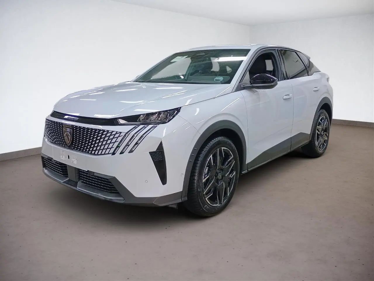 Peugeot 3008 Hybrid blanc Okenite vue 3/4 avant droit avec calandre distinctive et jantes alliage noires.