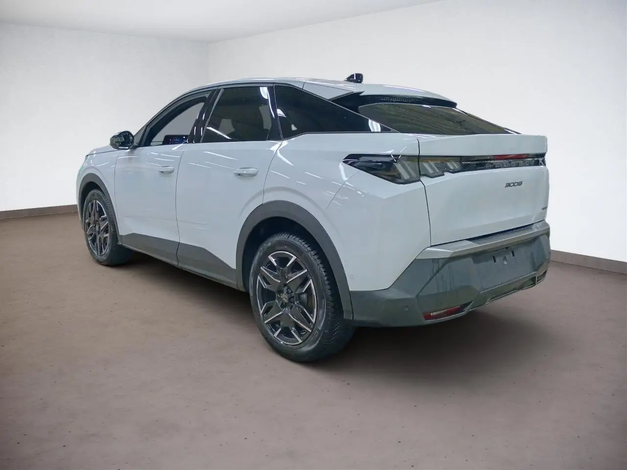 Volant cuir noir compact Peugeot 3008 Hybrid 2025 vu de face avec commandes intégrées et logo lion central.