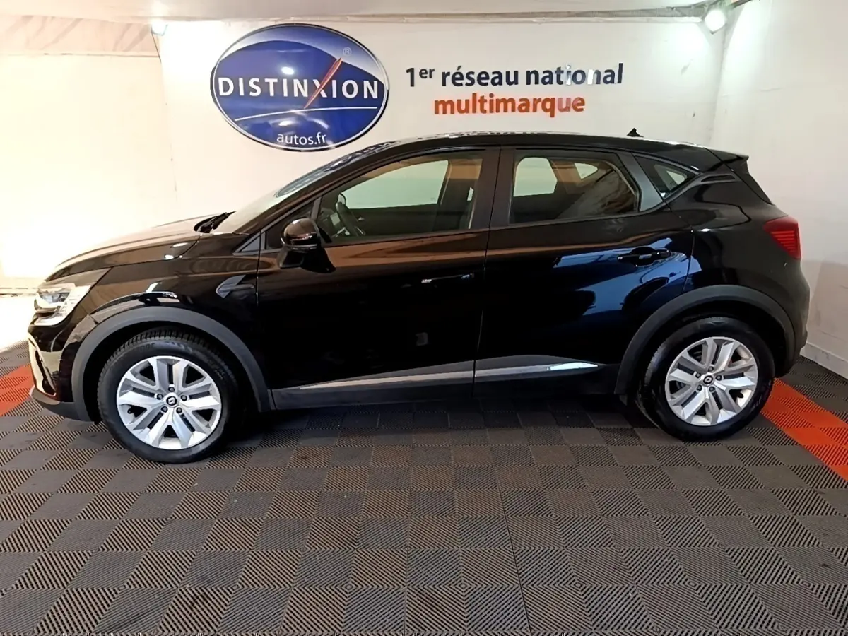 Profil côté gauche du Renault Captur Business noir 2021, avec jantes alliage et rétroviseurs noirs brillants.