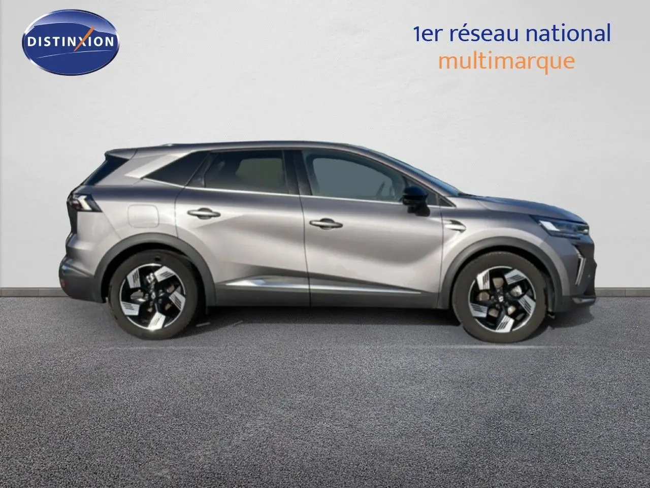 Profil droit du Renault Symbioz 2025 gris cassiopée métallisé avec jantes noires et détails chromés.