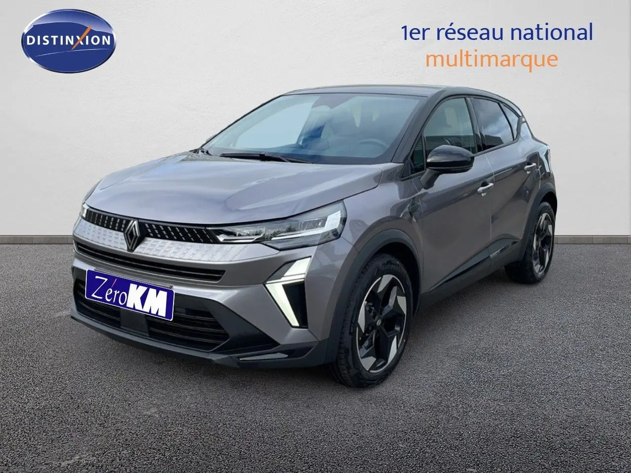 Renault Captur E-Tech hybride gris cassiopée métal vue 3/4 avant avec toit noir et jantes noires distinctives.