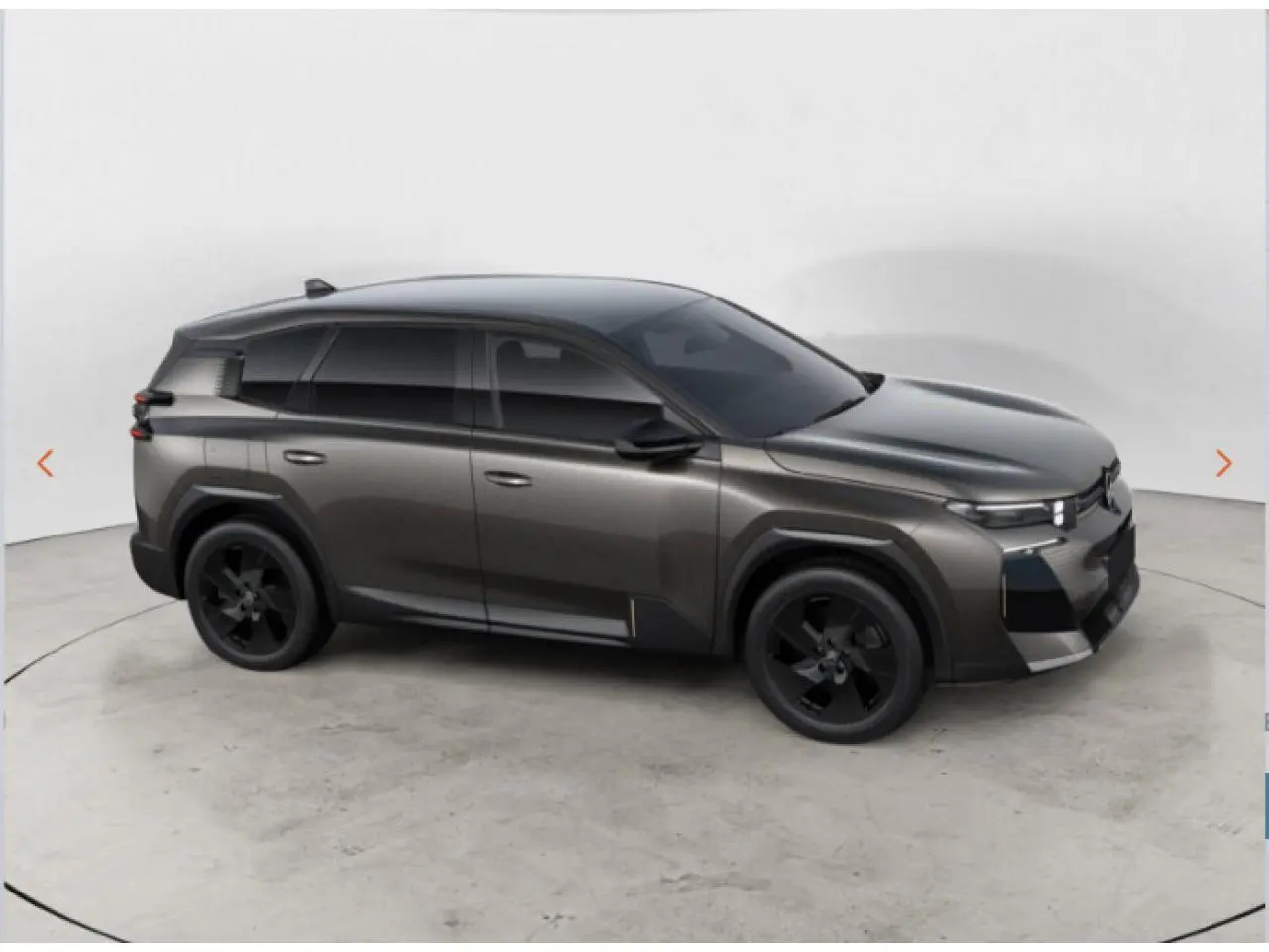 Vue de profil côté droit du Citroën C5 Aircross gris avec jantes noires et vitres teintées.