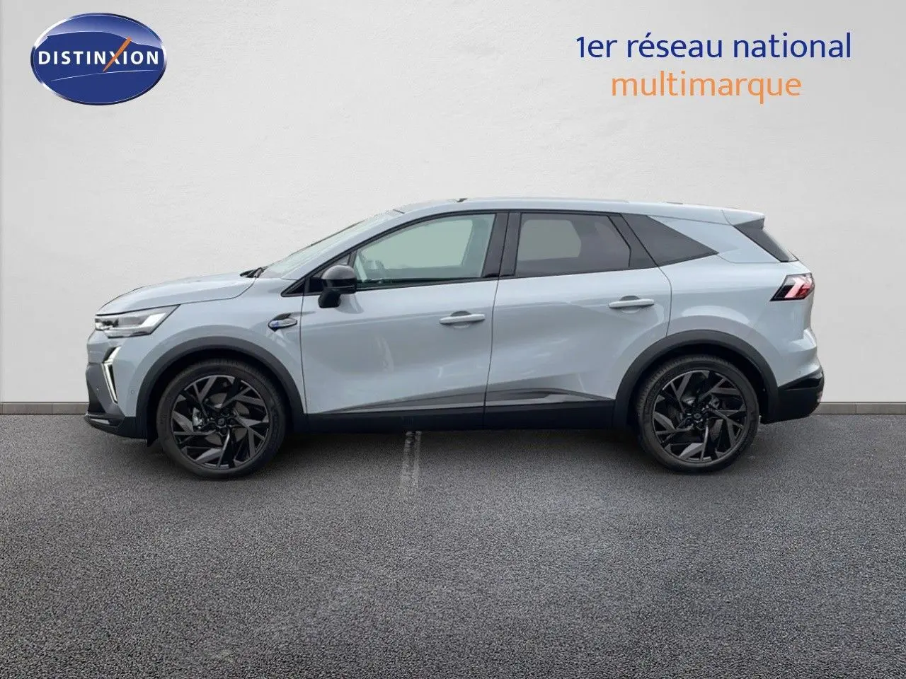 Profil côté gauche du Renault SYMBIOZ gris Rafale métal 2025 avec jantes noires et lignes modernes.