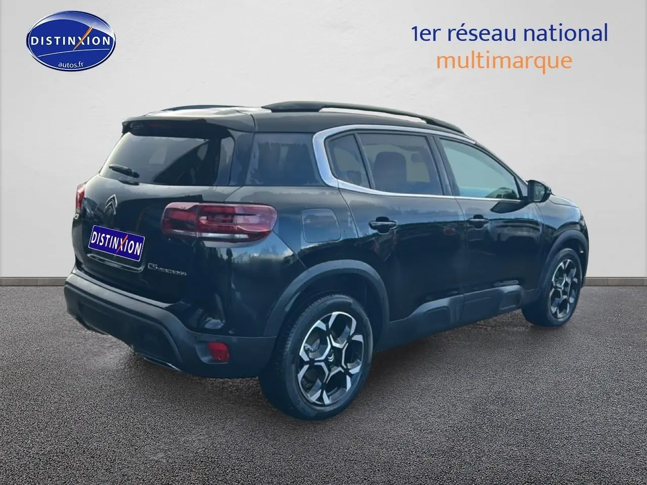 SUV Citroën C5 Aircross noir vue 3/4 arrière droit, jantes alu et vitres arrière teintées visibles.