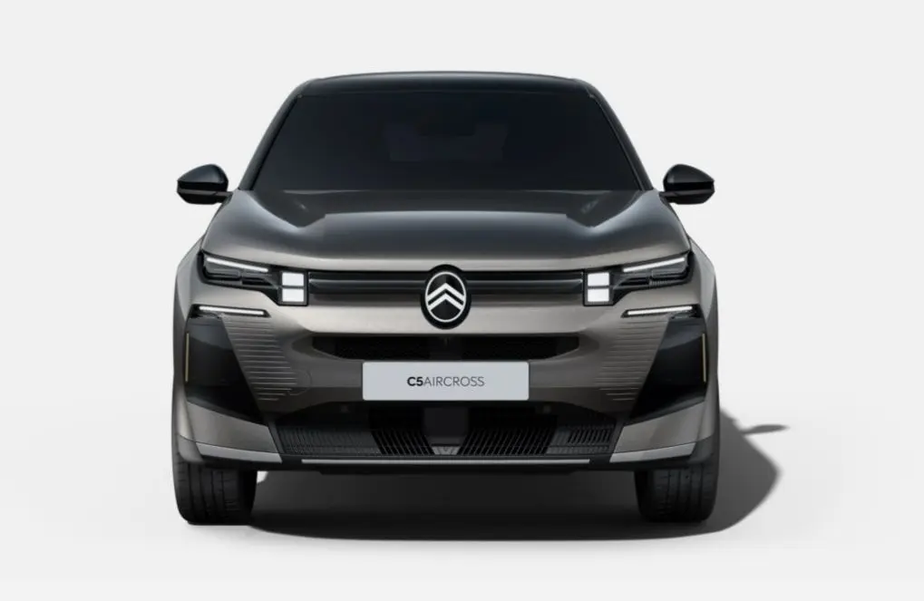 Vue avant du Citroën C5 Aircross gris Platinium avec toit noir et signature lumineuse LED distinctive.