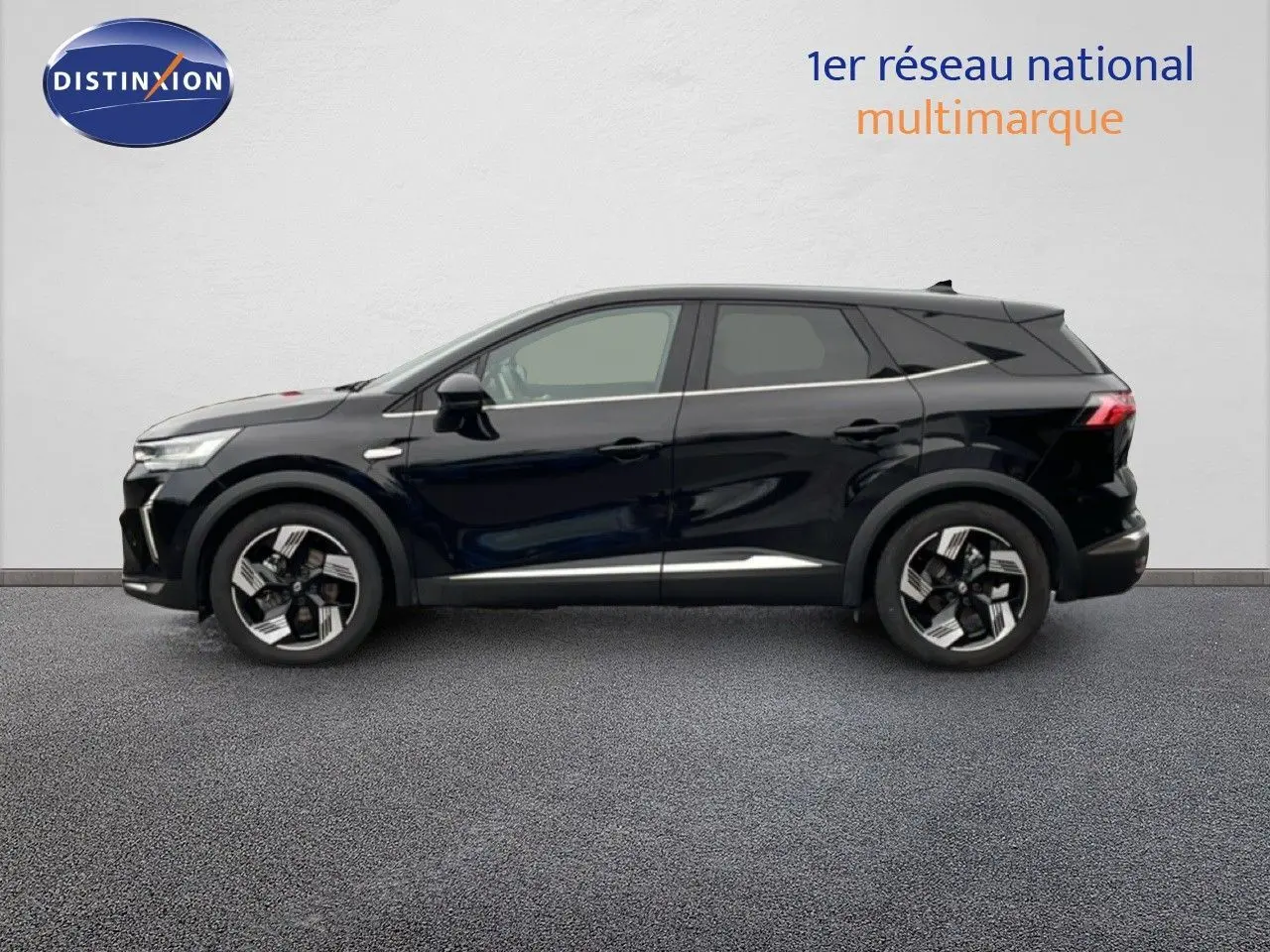 Profil côté gauche du Renault Symbioz noir étoile métal 2025 avec jantes modernes et lignes épurées.