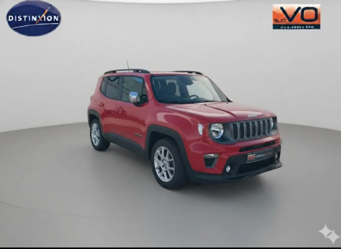 Jeep Renegade rouge vue 3/4 avant droit avec barres de toit et jantes alliage 17 pouces sur fond neutre.
