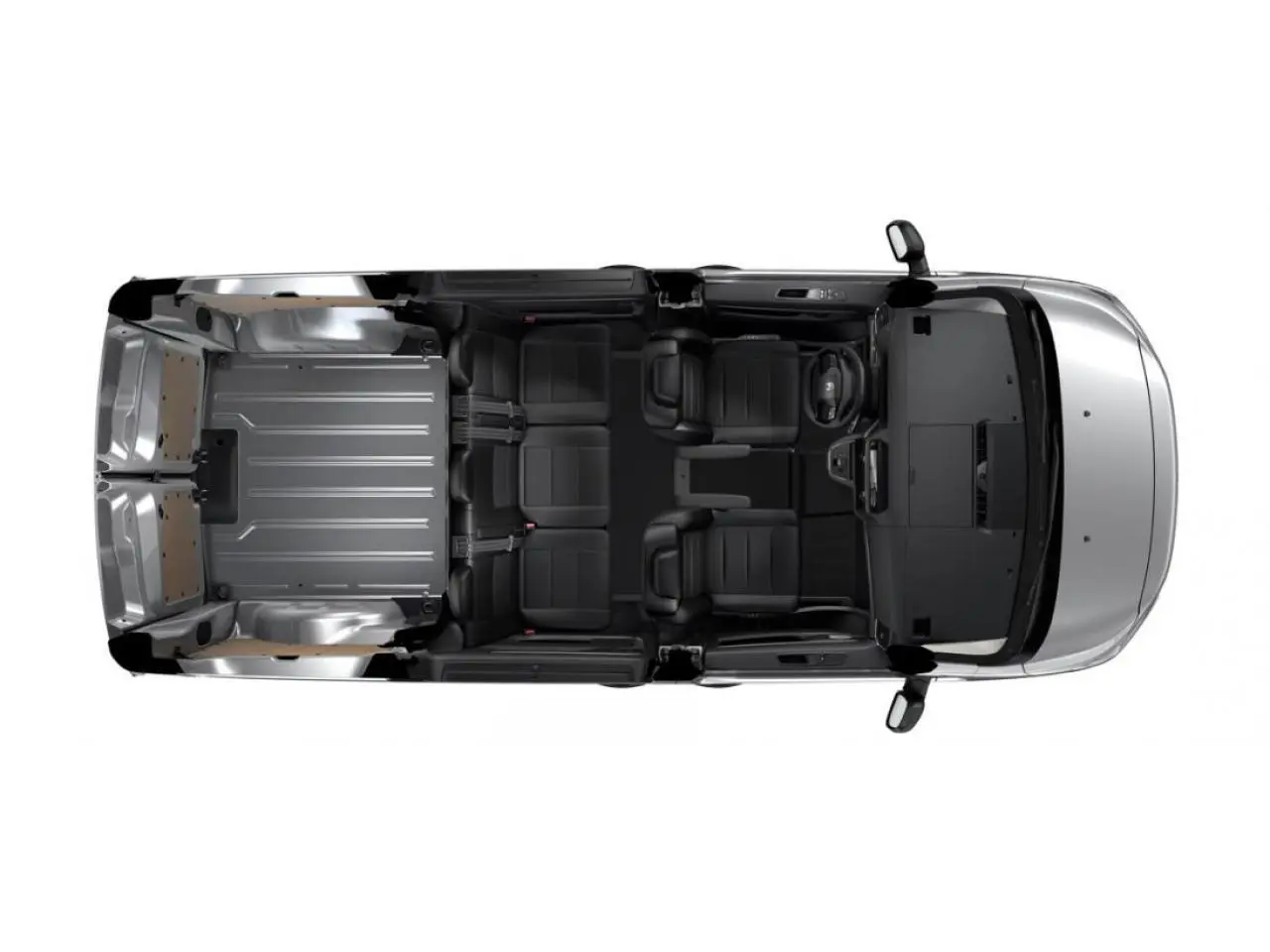 Vue aérienne intérieure du Citroën Jumpy gris, cabine approfondie avec sièges noirs et espace de chargement métallique.