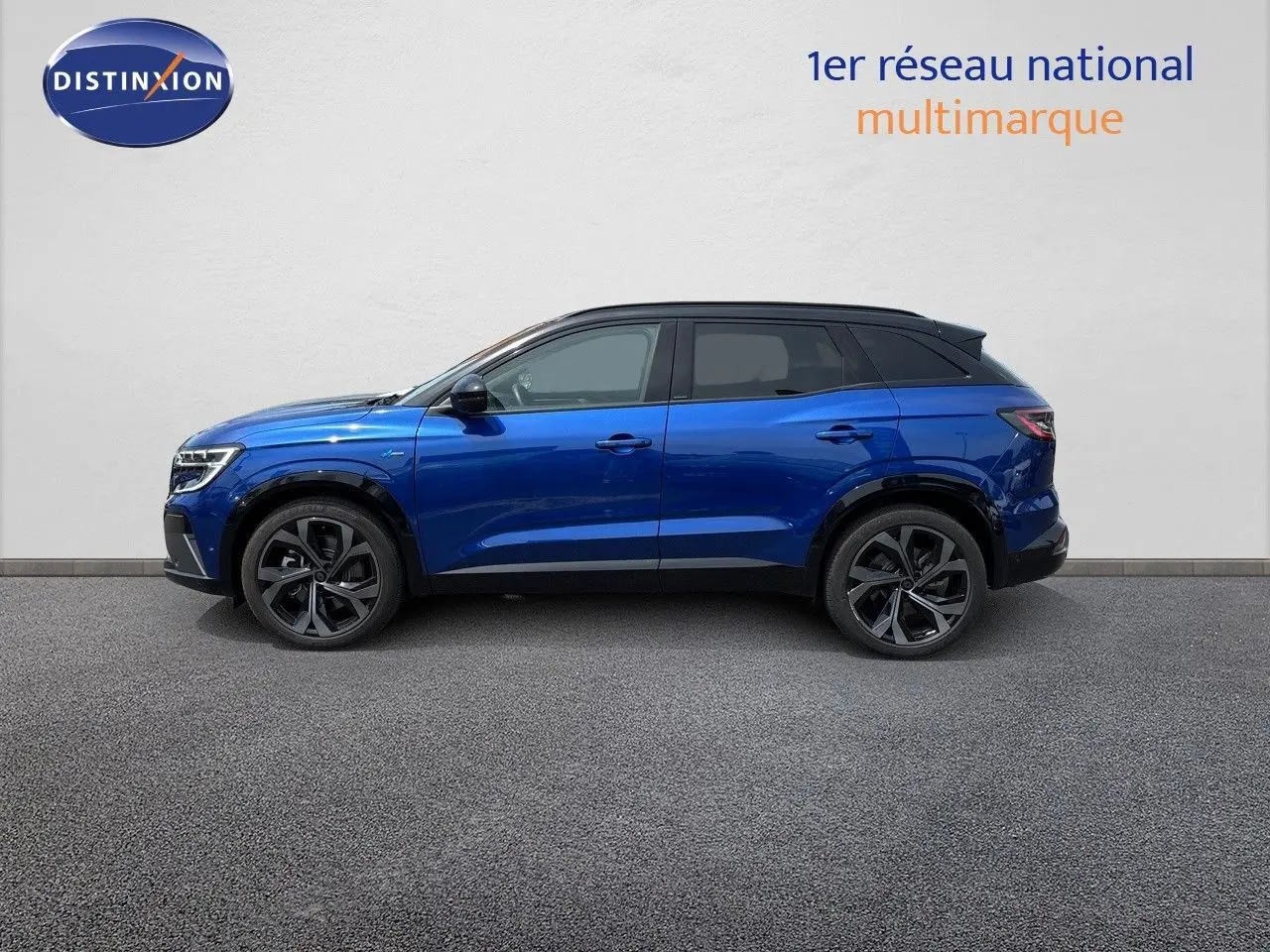 Renault Austral E-Tech hybride bleu Iron Metal avec toit noir, vue profil côté gauche sur fond neutre.