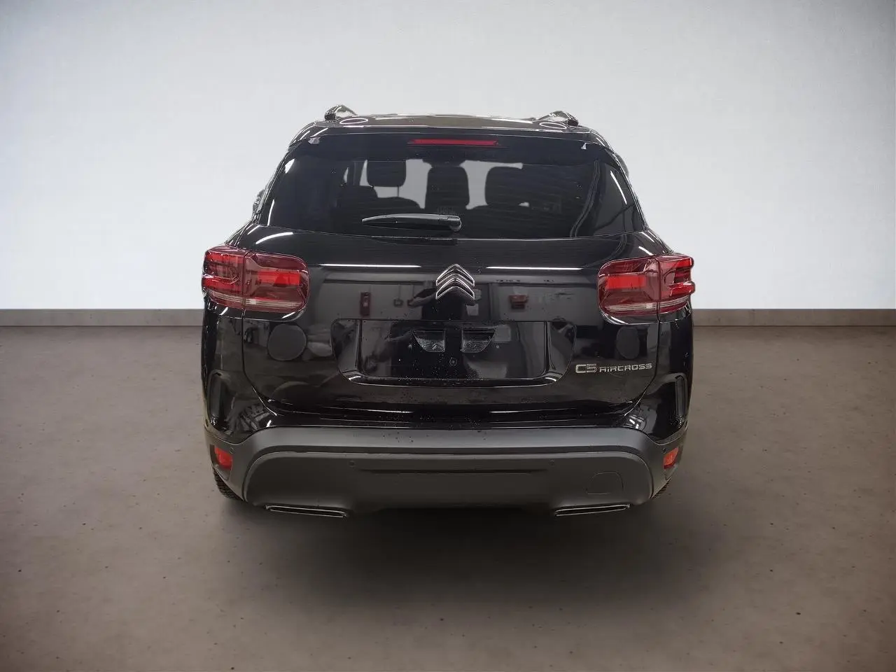 Vue arrière du Citroën C5 Aircross Hybrid noir Perla avec hayon électrique et feux arrière LED 3D.