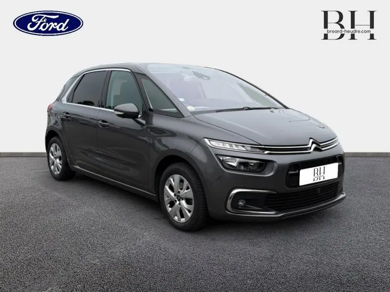 Citroën C4 Spacetourer gris Platinium vue 3/4 avant droit avec feux LED et jantes alu visibles.