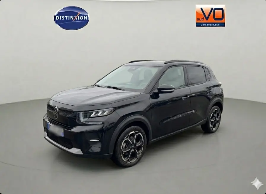 SUV Citroën noir en 3/4 avant droit avec jantes alliage et barres de toit visibles sur fond neutre.