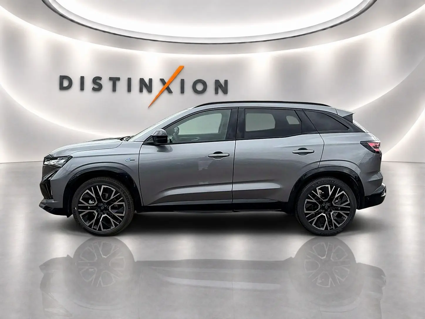 Profil droit du Renault Austral gris schiste 2026 esprit alpine avec jantes alu noires et toit noir contrasté.