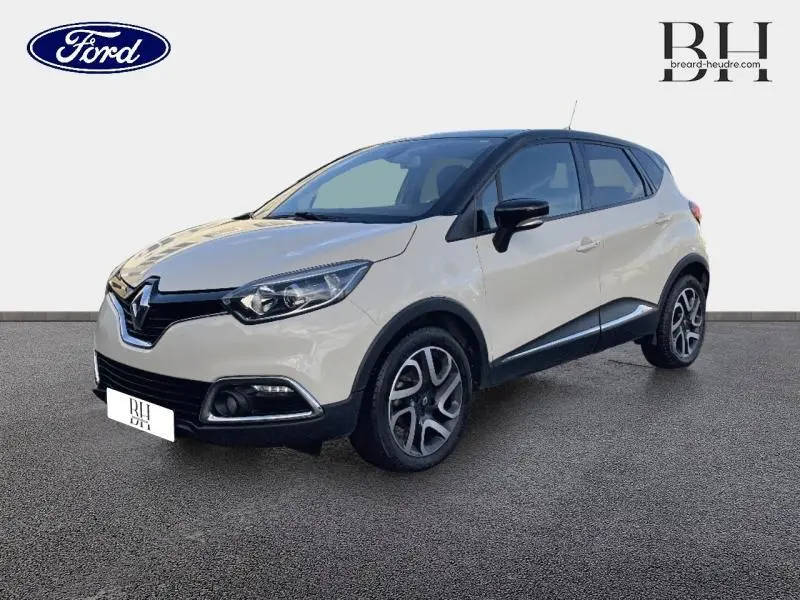 Renault Captur beige cendré avec toit noir étoilé, vue 3/4 avant droit sur fond neutre.
