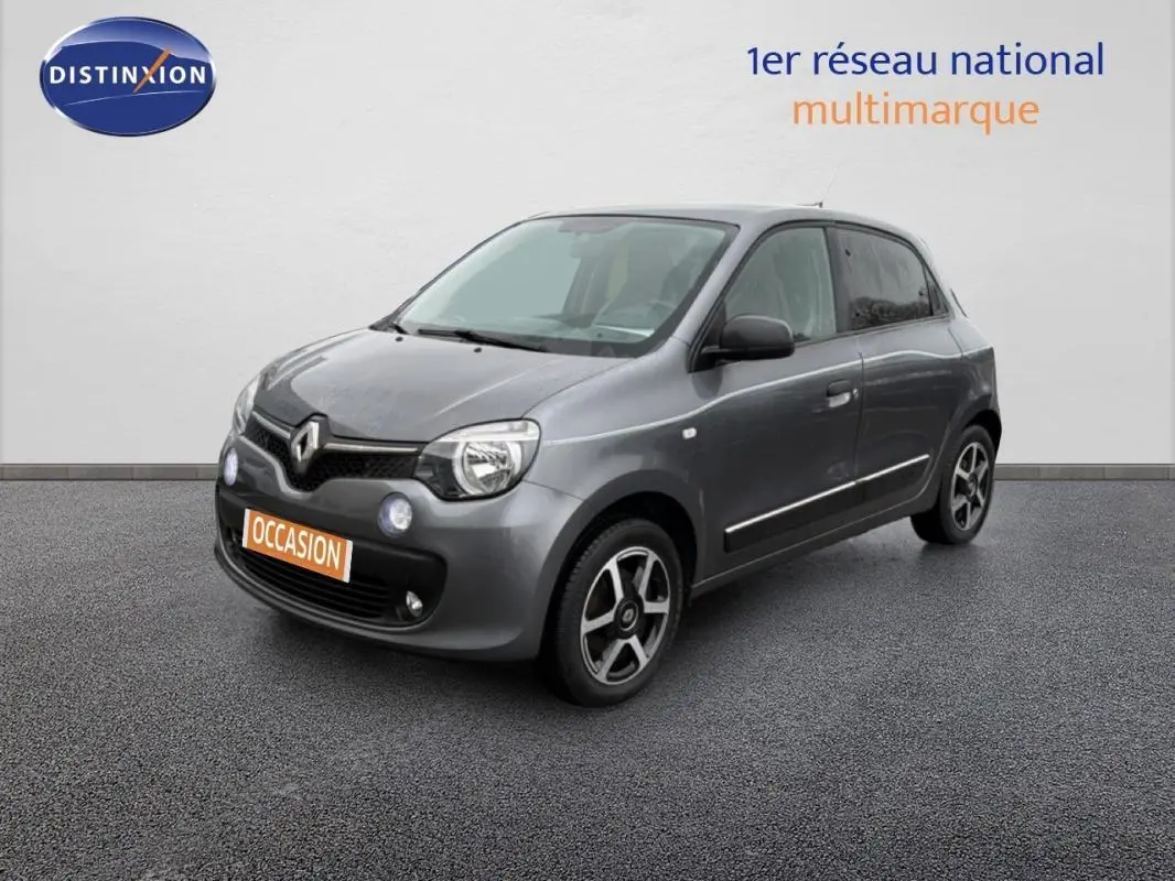 Renault Twingo III gris foncé vue 3/4 avant droit avec jantes alliage et vitres surteintées.