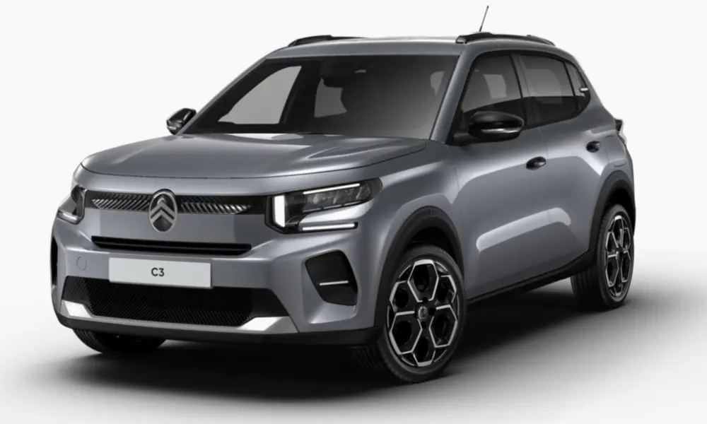 Citroën C3 hybride gris foncé vue 3/4 avant droit avec phares LED et jantes noires à motifs géométriques.