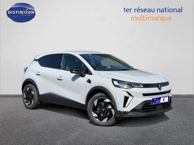 Renault Captur 1.8 E-Tech hybride gris Rafale, vue 3/4 avant avec jantes noires et détails LED.