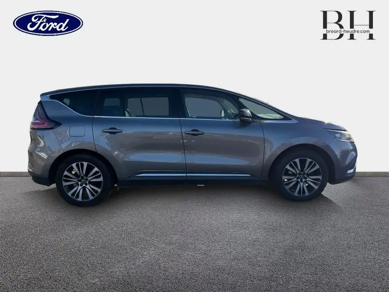 Profil côté gauche d'un Renault Espace gris Cassiopée 2016, mettant en valeur ses lignes fluides et jantes alliage.