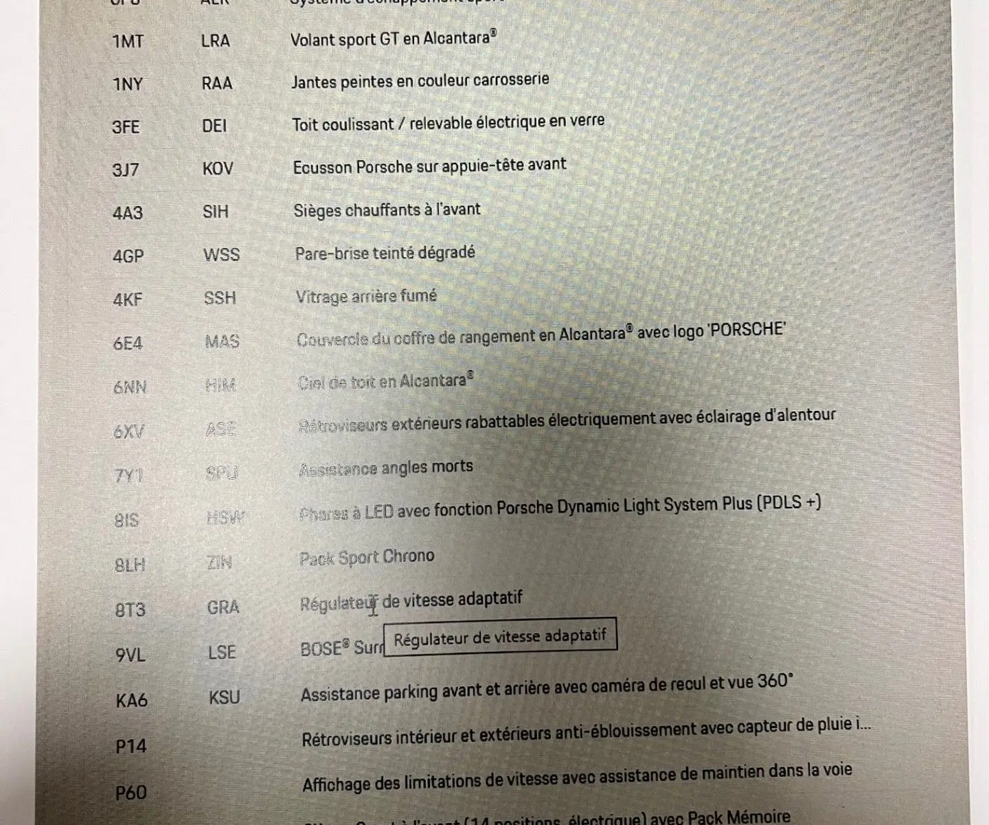 Vue 3/4 avant d'une Porsche 911 Carrera S argent GT avec jantes RS Spyder et jupes latérales sport design visibles.