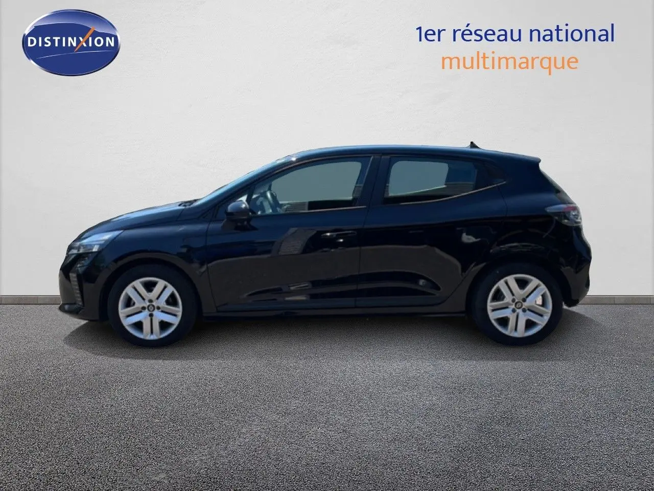 Profil droit d'une Renault Clio 2025 noir étoile métal, avec jantes alliage et lignes épurées visibles.