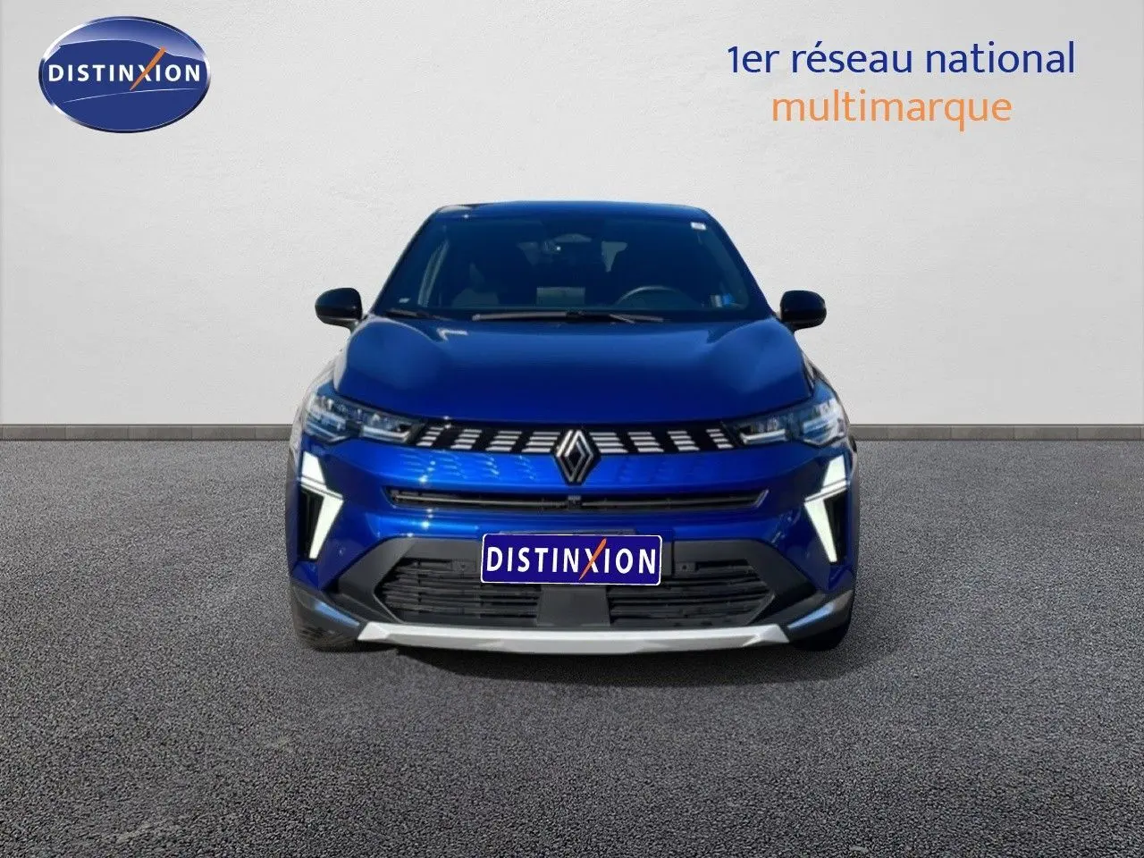 Vue 3/4 arrière droite d'un Renault Symbioz bleu iron metal avec feux arrière LED et jantes bi-ton.