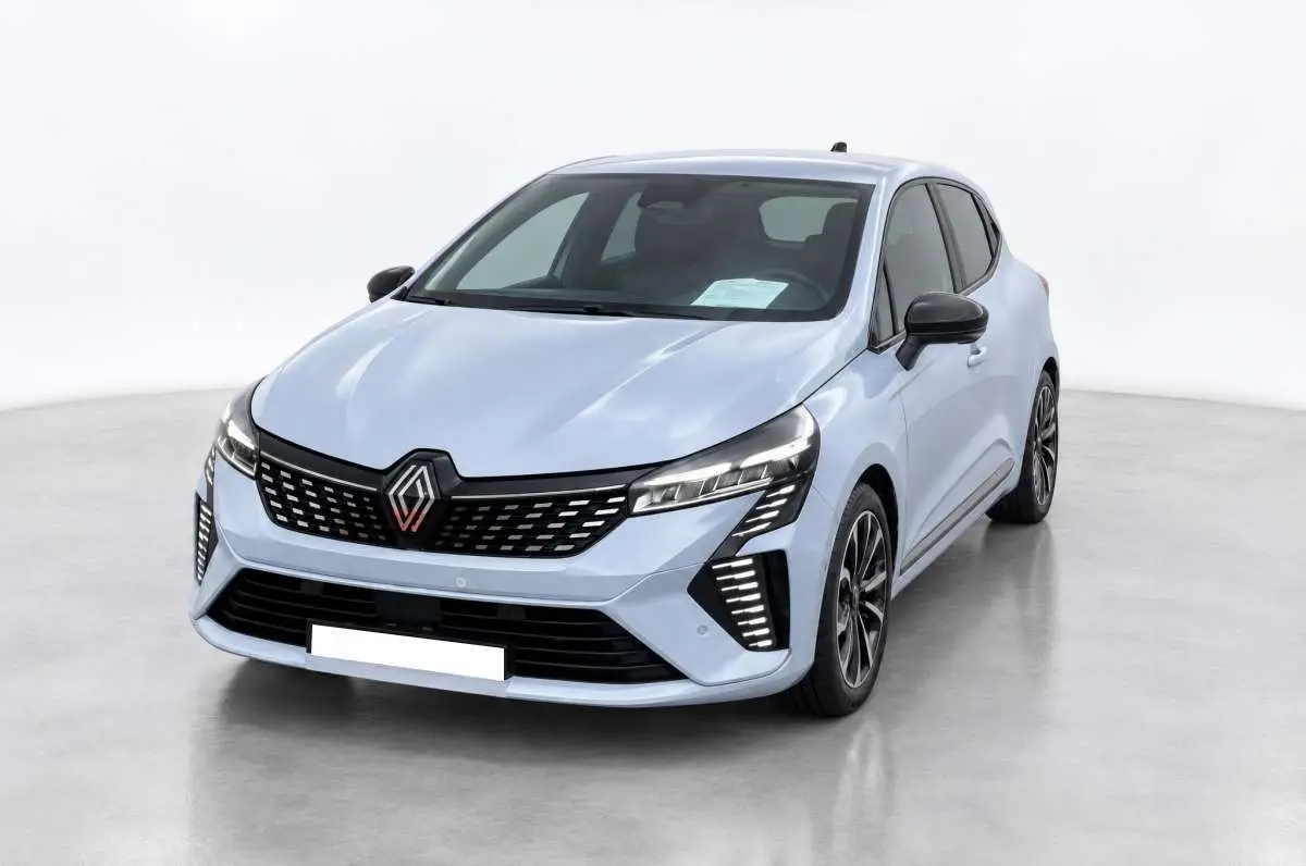Renault Clio 2025 gris rafale vue 3/4 avant droit avec feux LED et jantes alu noires distinctives.