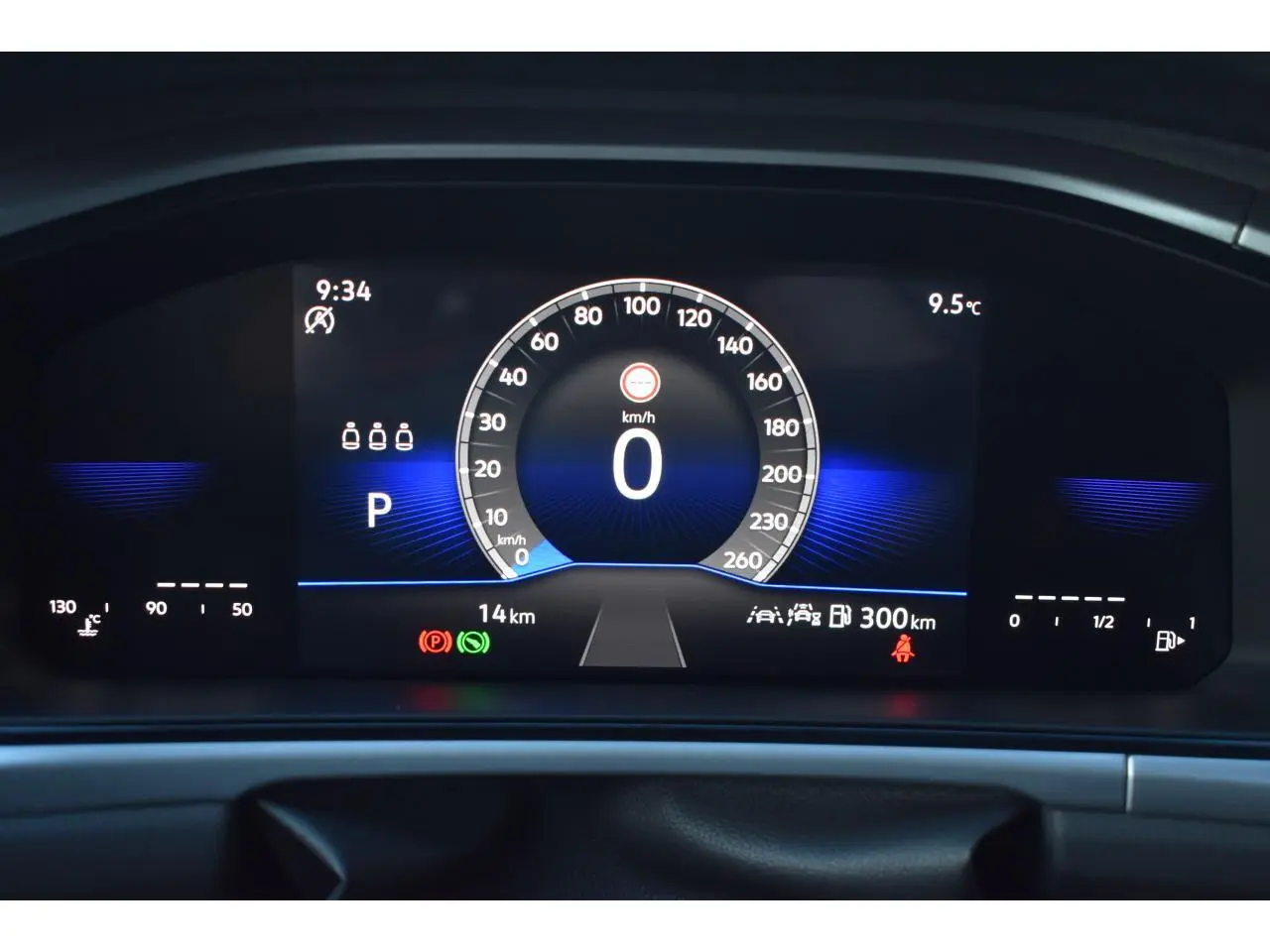 Affichage digital du combiné d'instruments du Volkswagen T-Roc 2025, vitesse à zéro, fond bleu et noir.