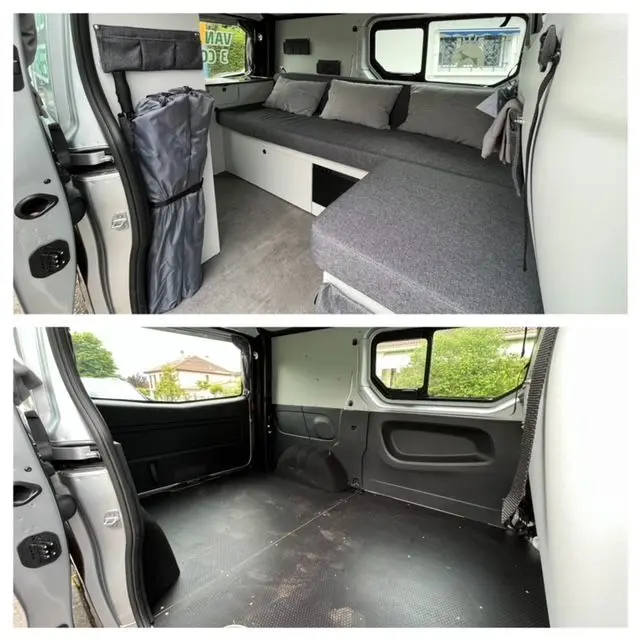 Intérieur du Renault Trafic Fourgon gris Comète vu côté gauche, montrant l'aménagement avec banquette-lit et rangements.