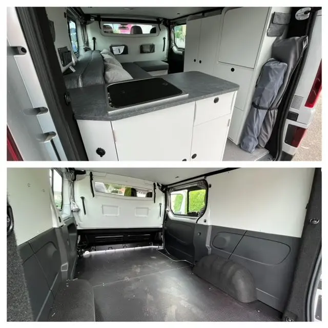Intérieur arrière du Renault Trafic gris Comète aménagé en van, avec cuisine et rangements visibles côté droit.
