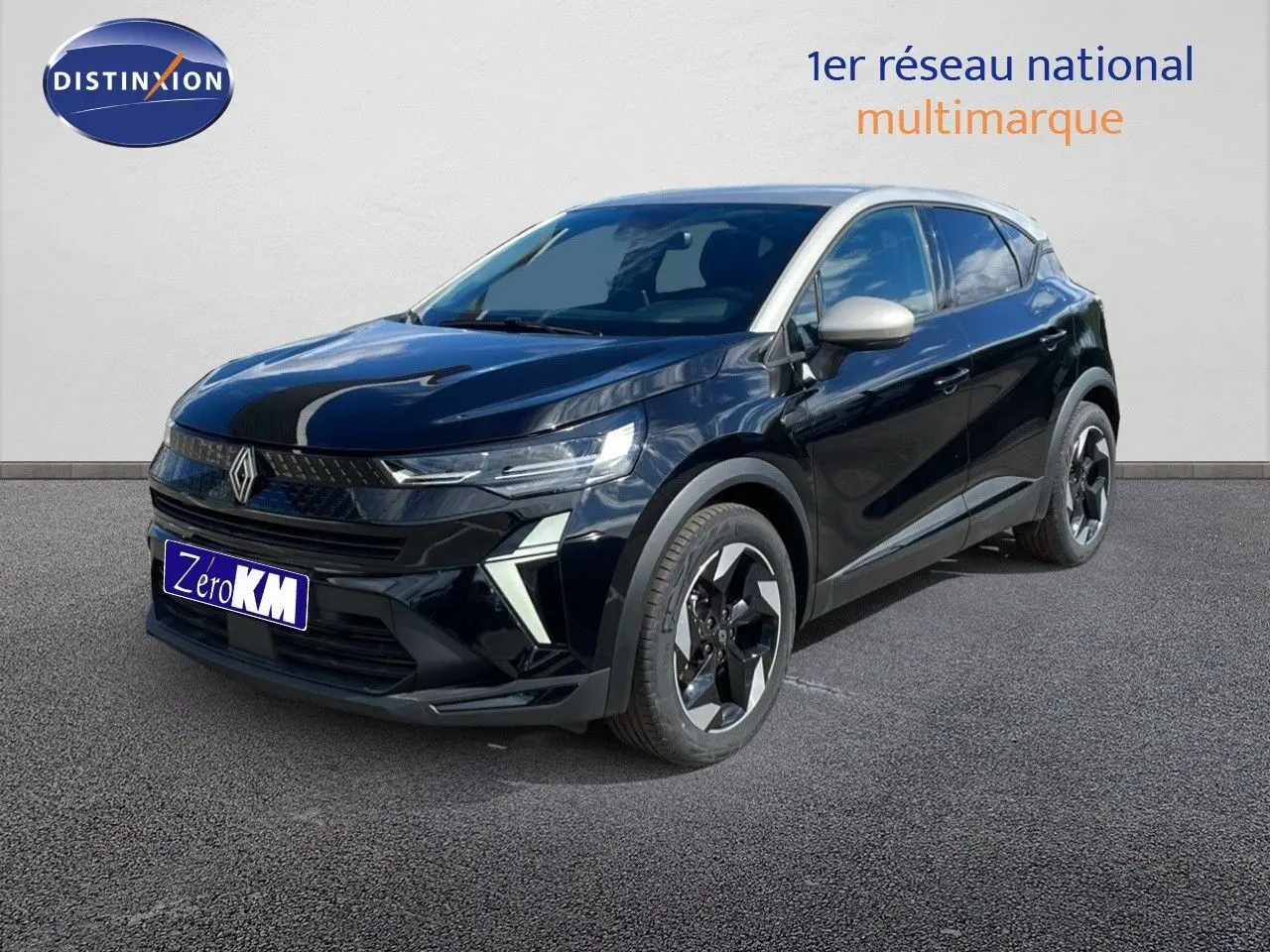 Renault Captur 2025 noir étoile métal avec toit gris, vue 3/4 avant droit mettant en valeur ses phares LED distinctifs.