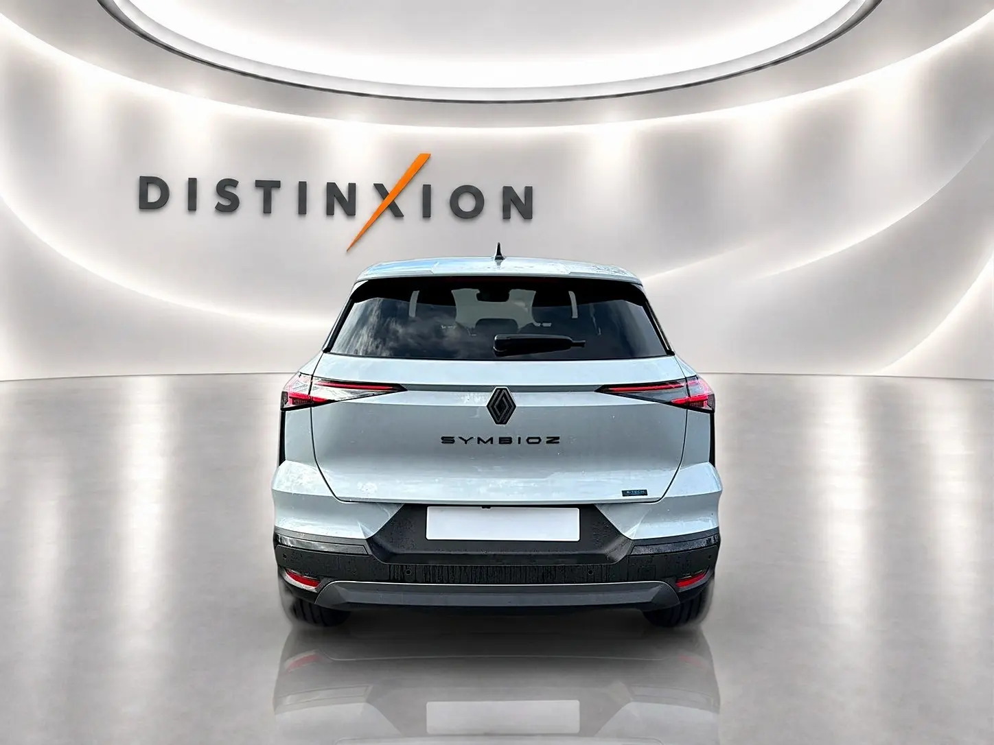 Vue arrière du Renault Symbioz gris rafale 2026 avec feux LED fins et logo distinctif au centre du hayon.