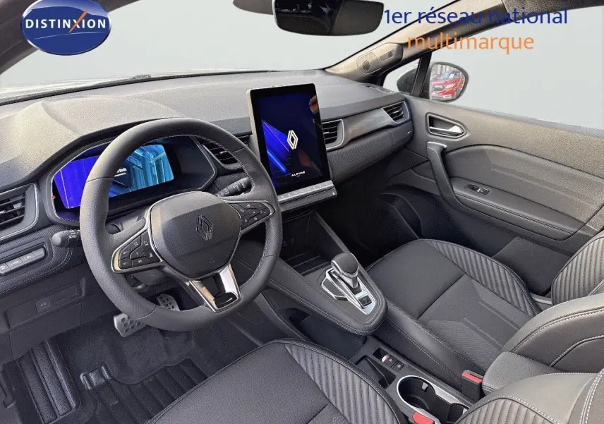 Intérieur Renault Symbioz 2024 gris Cassiope, vue côté conducteur avec écran vertical et sièges électriques.