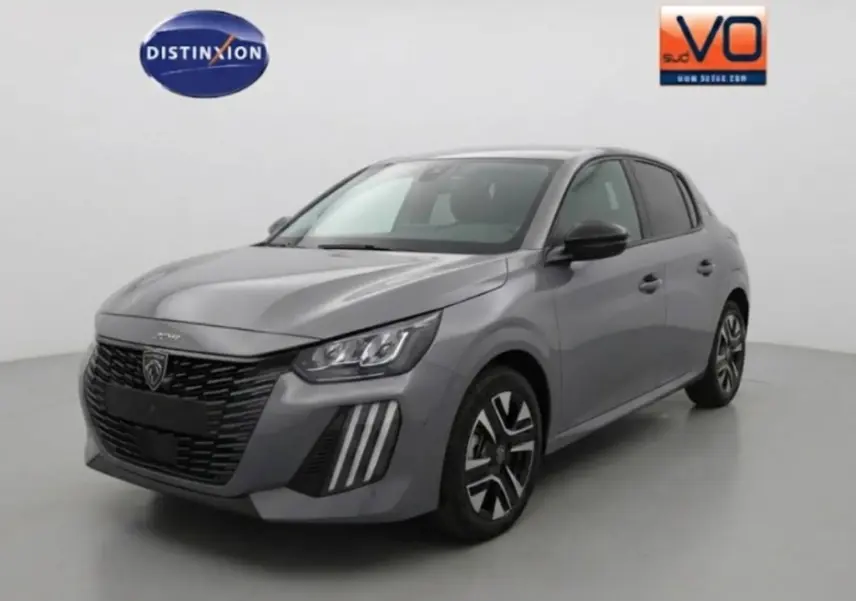 Peugeot 208 Hybrid gris vue 3/4 avant droit, avec calandre noire et jantes alliage 16 pouces visibles.
