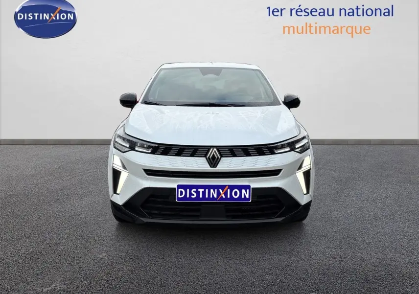 Vue avant d'une Renault Symbioz blanc nacré avec éclairage LED distinctif et calandre noire moderne.