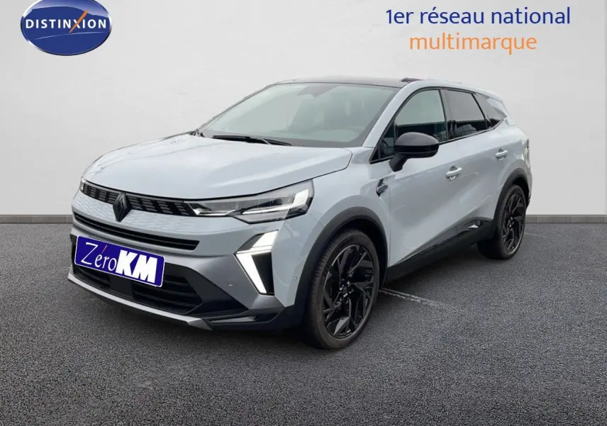 Renault Symbioz E-Tech Full Hybrid 145 Esprit Alpine gris Rafale métal en 3/4 avant droit avec jantes noires.