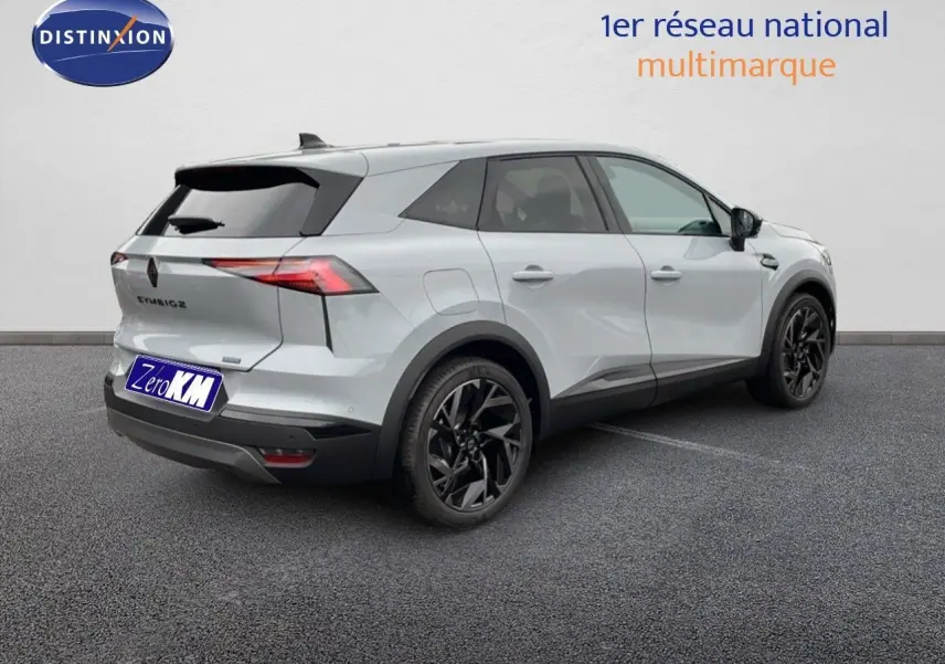 Vue 3/4 arrière droite du Renault Symbioz gris Rafale métal avec jantes noires et feux arrière LED distinctifs.