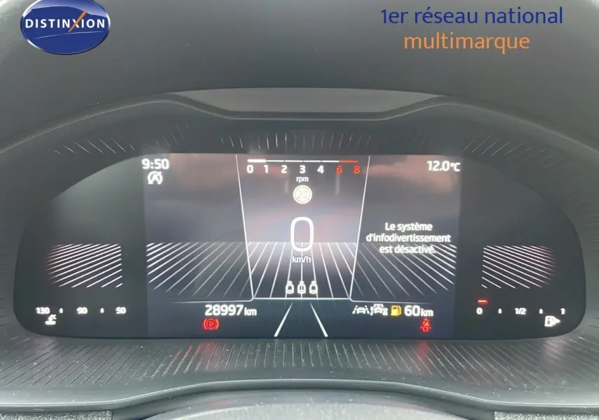 Tableau de bord numérique du Skoda Kamiq 2024 affichant 28 997 km, vitesse à 0 km/h et température extérieure à 12°C.