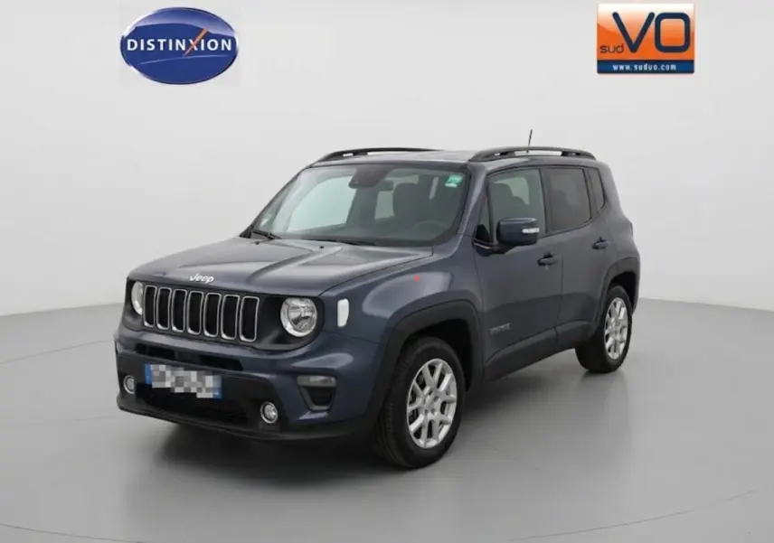 Jeep Renegade bleu en 3/4 avant droit avec barres de toit et jantes alliage 17 pouces visibles.