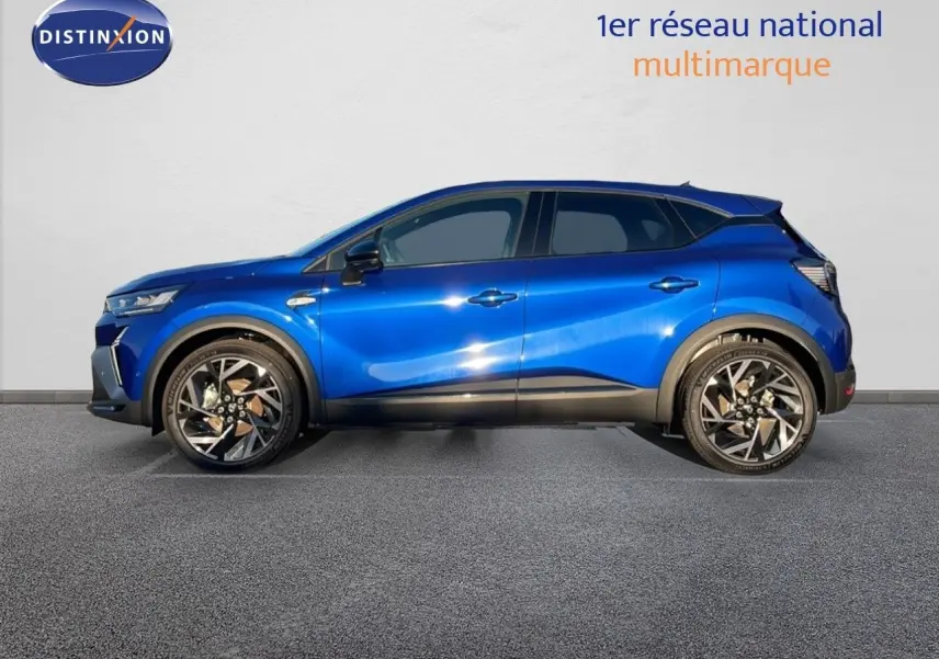 Profil droit du Renault Captur E-Tech hybride 2025 en bleu Iron Metal avec toit noir et jantes alliage distinctives.