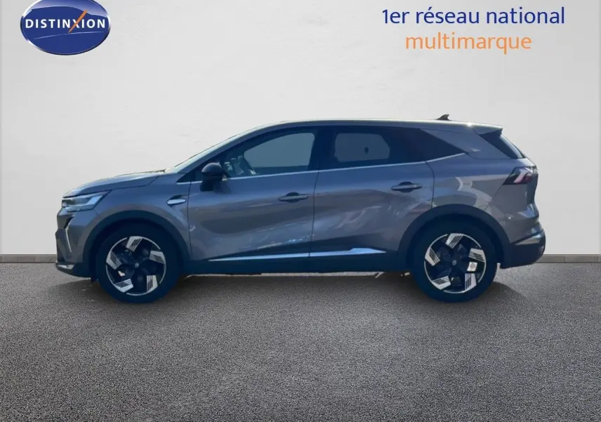 Profil droit du Renault Symbioz 1.6 E-Tech gris cassiopée métal avec jantes modernes et lignes dynamiques.
