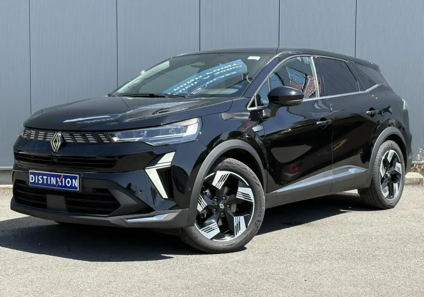 Renault Symbioz noir étoilé en 3/4 avant droit, avec jantes 18 pouces et calandre distinctive lumineuse.